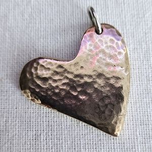 Retired James Avery hammered heart pendant